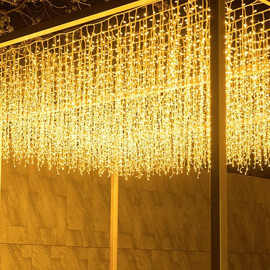 ZIMINGU Icicle Christmas Lights, 16.4 FT 120 LEDs 8 Modes, Hanging Twinkle Connectable Memory Fairy Curtain String Lights for Indoor Eaves Shopping Outdoor Decor, Warm White, 5M06